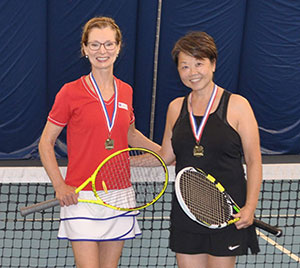 photo of tournament winners at Montgomery Tennisplex and Tennis WinWin Racquets and Rockets Adult Tennis and Fireworks Party 2018